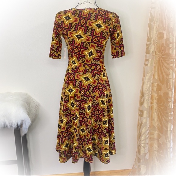 💕NWT Lularoe Nicole Dress Mustard Colored with Fun Star patterns💕 - Picture 7 of 12